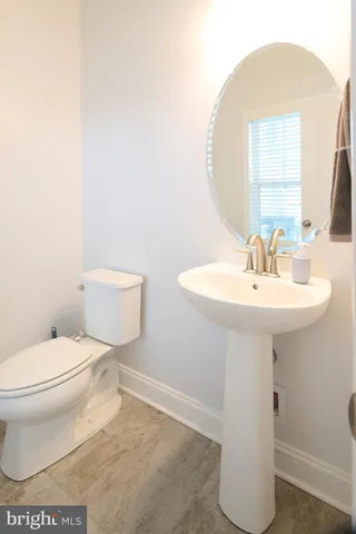 a view of storage and utility room with washer and dryer