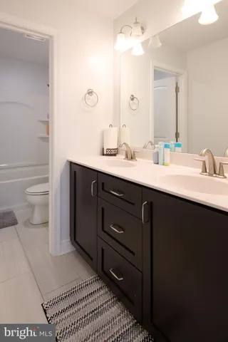 a bathroom with a sink and a bathtub