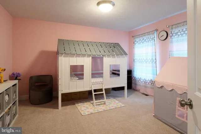 a view of a terrace with wooden floor and fence