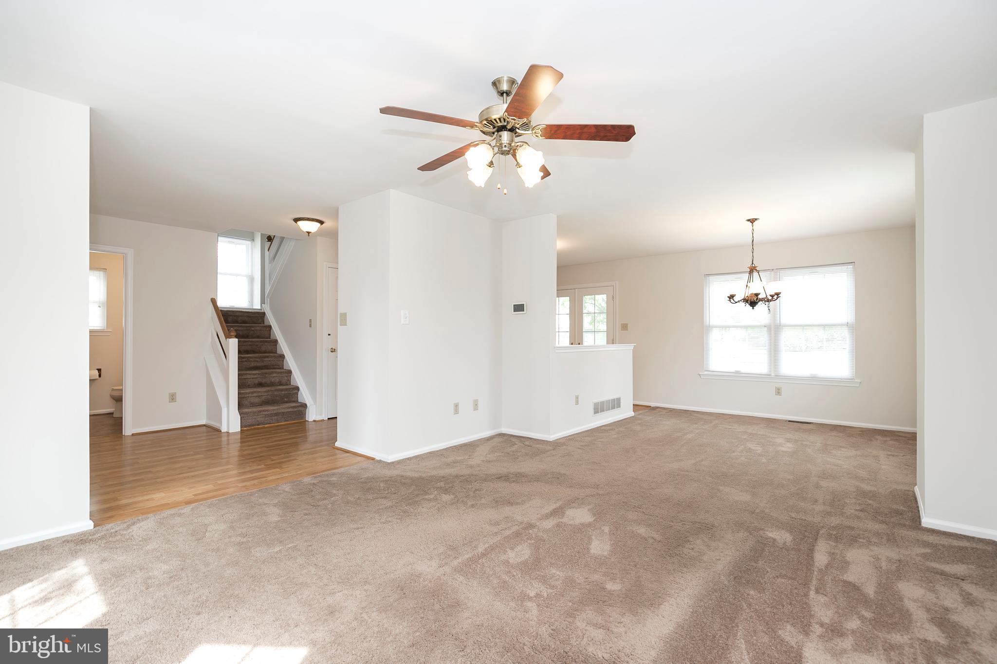 115 Yorktown Road Collegeville, PA 19426 - Photo 13 of 28 Living room, foyer and dining room