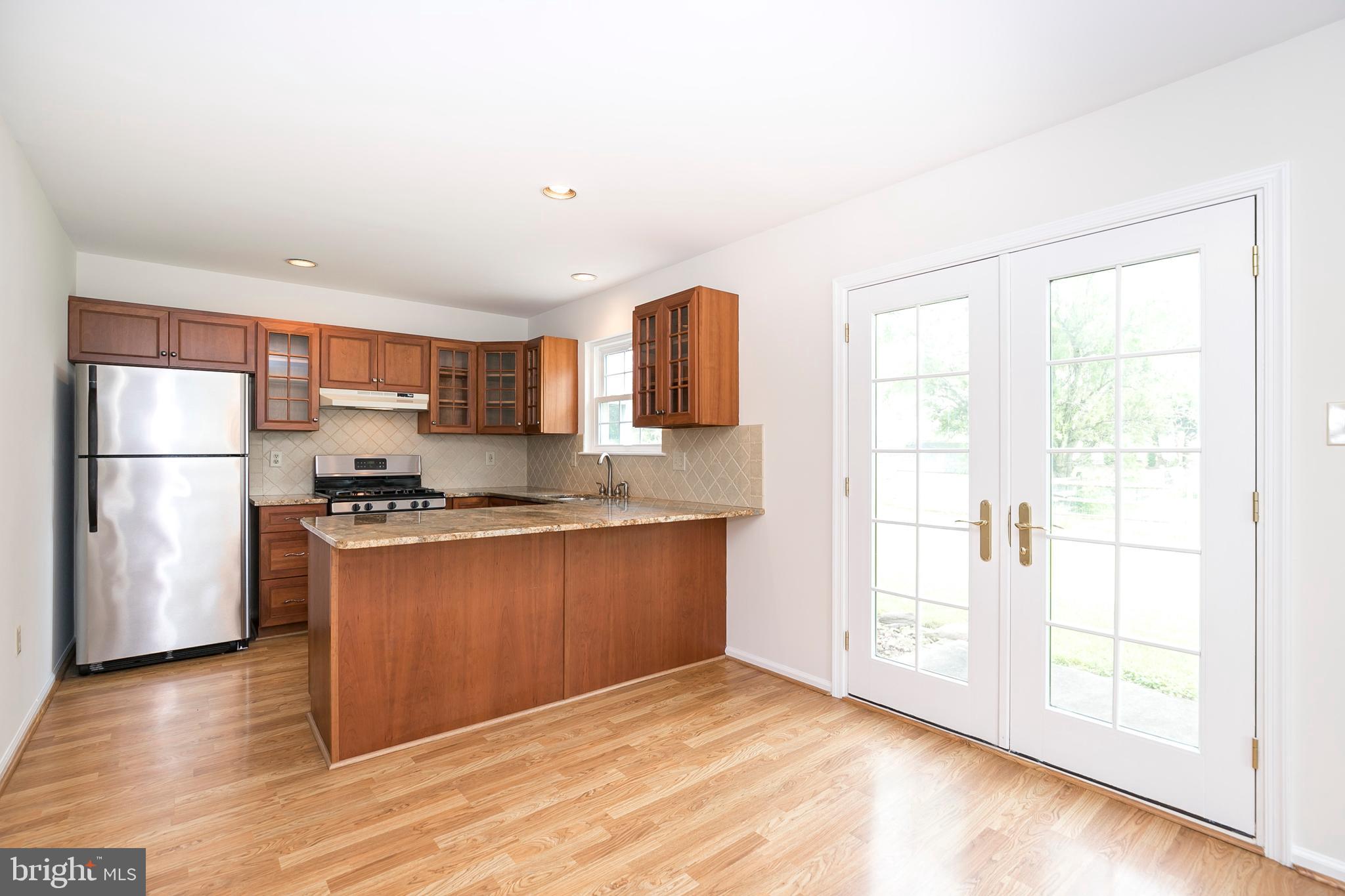 115 Yorktown Road Collegeville, PA 19426 - Photo 3 of 28 Kitchen with upgraded cabinets, granite counters