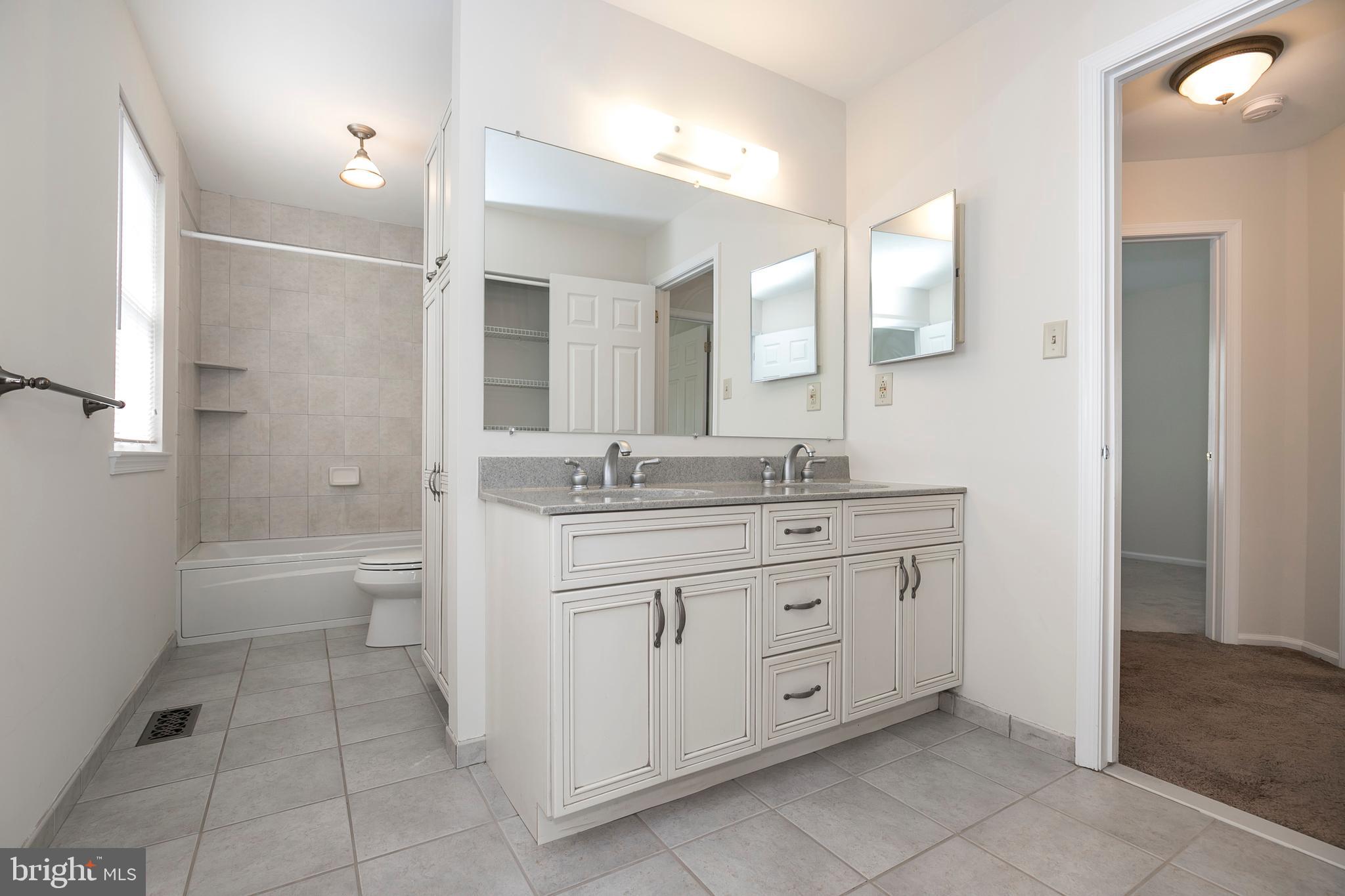115 Yorktown Road Collegeville, PA 19426 - Photo 21 of 28 Ceramic flooring, surround, double sink