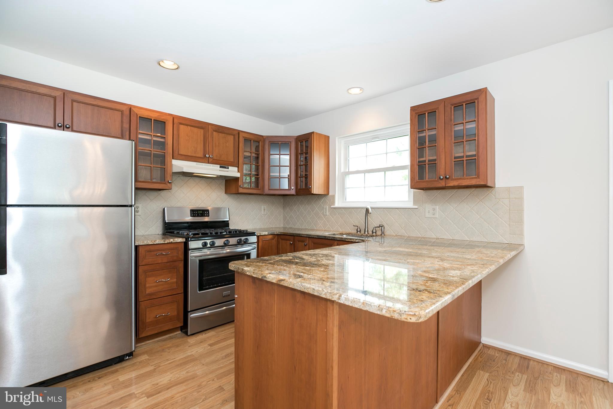115 Yorktown Road Collegeville, PA 19426 - Photo 4 of 28 Nice display cabinets, bottom cabinets w/ drawers