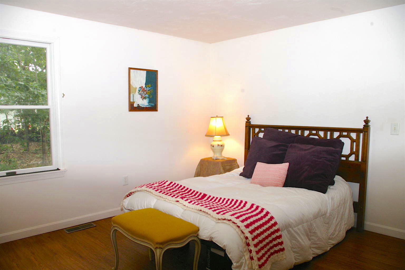 10 Juniper Way Eastham, MA 02642 - Photo 15 of 31 a bedroom with a bed and a window