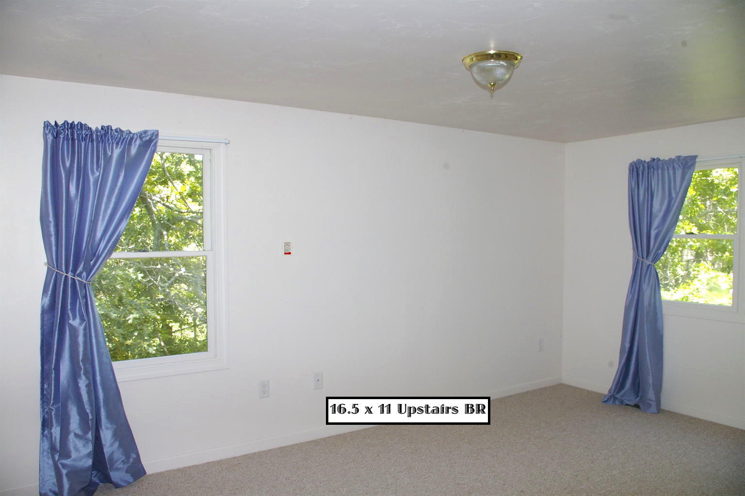 10 Juniper Way Eastham, MA 02642 - Photo 20 of 31 a view of room with window and stairs