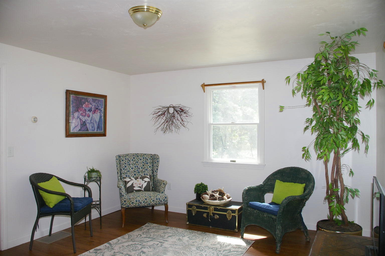10 Juniper Way Eastham, MA 02642 - Photo 10 of 31 a living room with furniture and a potted plant