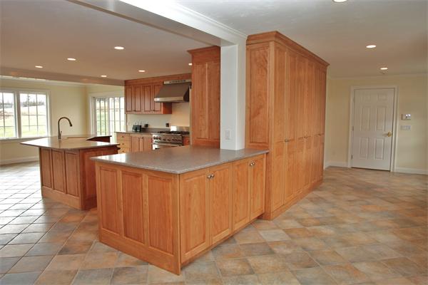486 Greenwich Road Hardwick, MA 01037 - Photo 13 of 30 a large kitchen with stainless steel appliances a large counter top a stove a refrigerator and a sink