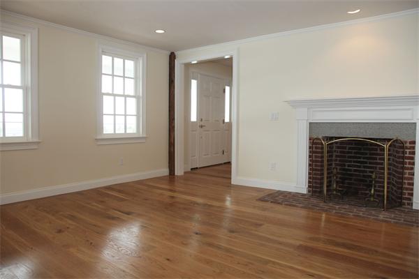 486 Greenwich Road Hardwick, MA 01037 - Photo 19 of 30 an empty room with wooden floor fireplace and windows