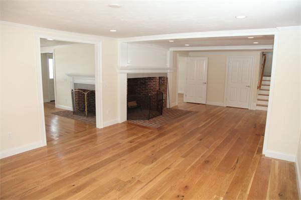 486 Greenwich Road Hardwick, MA 01037 - Photo 20 of 30 an empty room with wooden floor and fireplace
