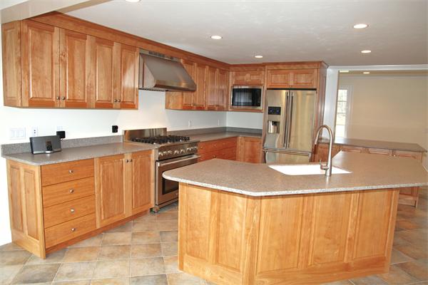 486 Greenwich Road Hardwick, MA 01037 - Photo 9 of 30 a kitchen with stainless steel appliances granite countertop a sink a stove and a refrigerator