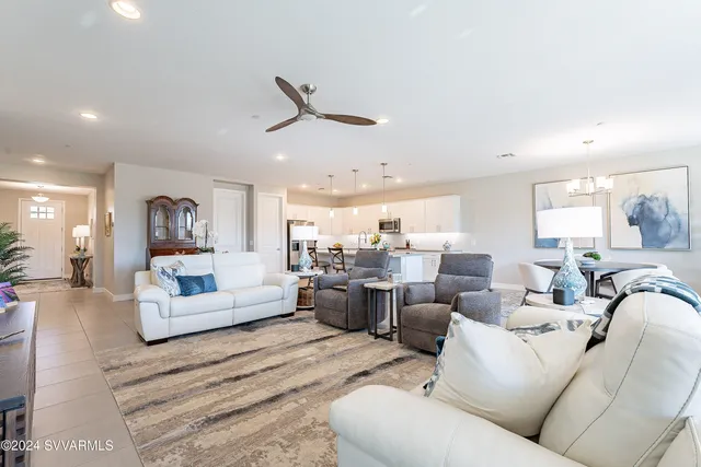 a shelf with books and knick knacks on it