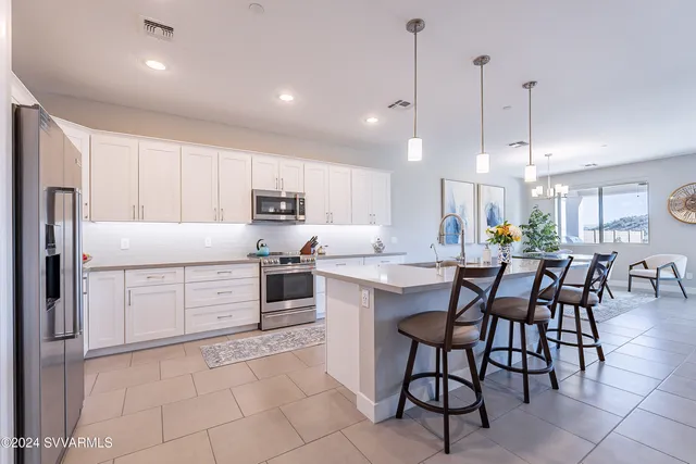 a view of a workspace with furniture