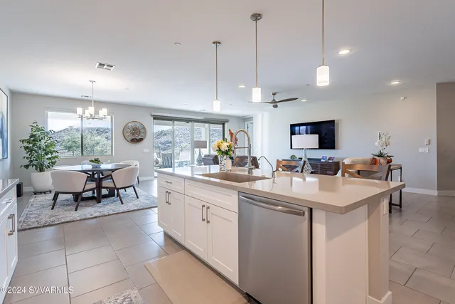 a view of a workspace with furniture