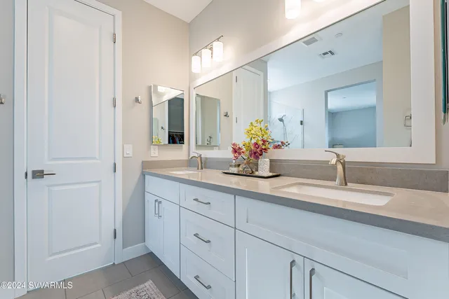a view of a patio with a table and chairs