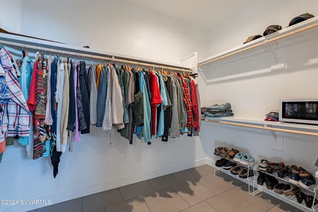 a view of a street with a building in the background