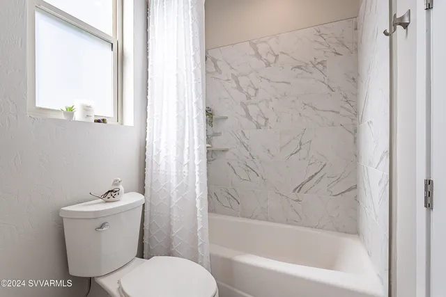 a view of a house with a garden