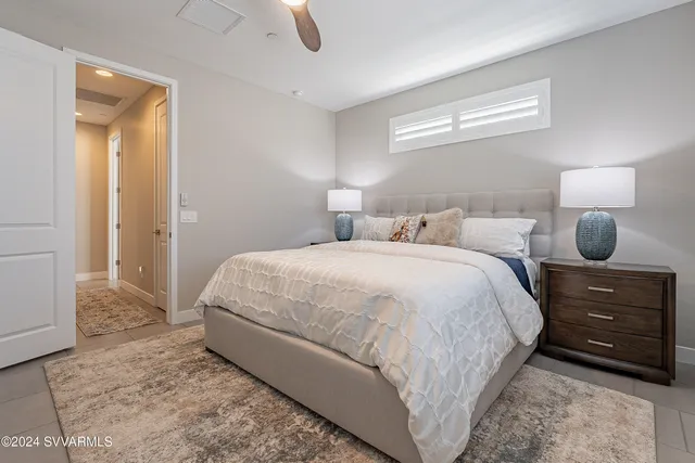 a view of a patio with furniture and a yard