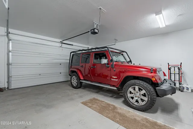 a view of a backyard with sitting area