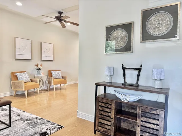 a view of a livingroom with furniture and a table