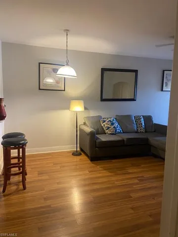 a living room with couch and a table