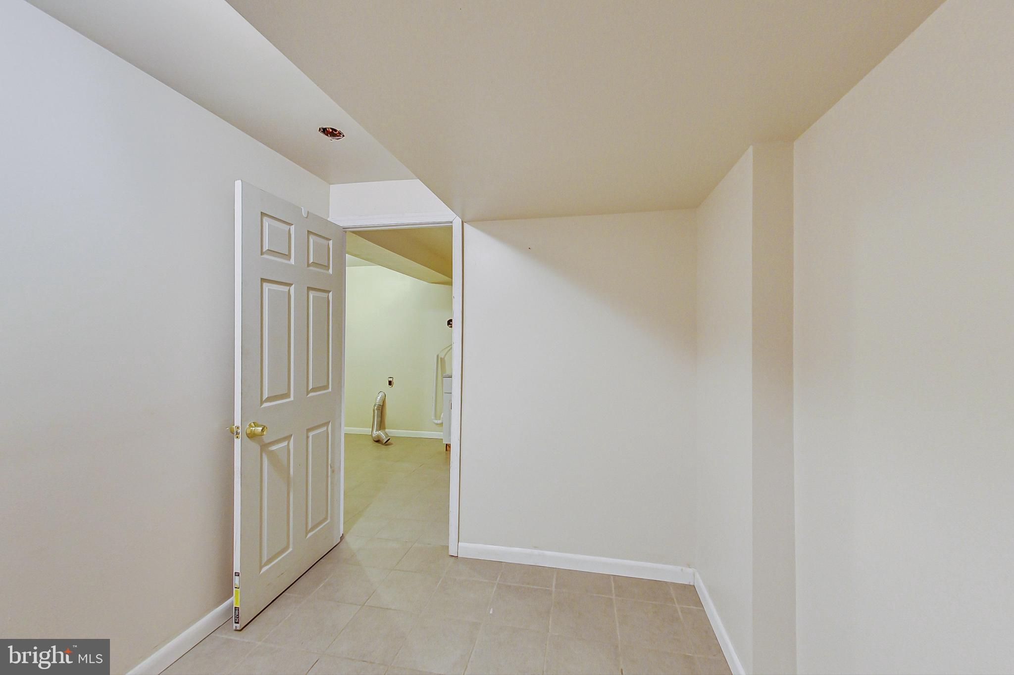 4525 Hawksbury Road Baltimore, MD 21208 - Photo 34 of 53 Den