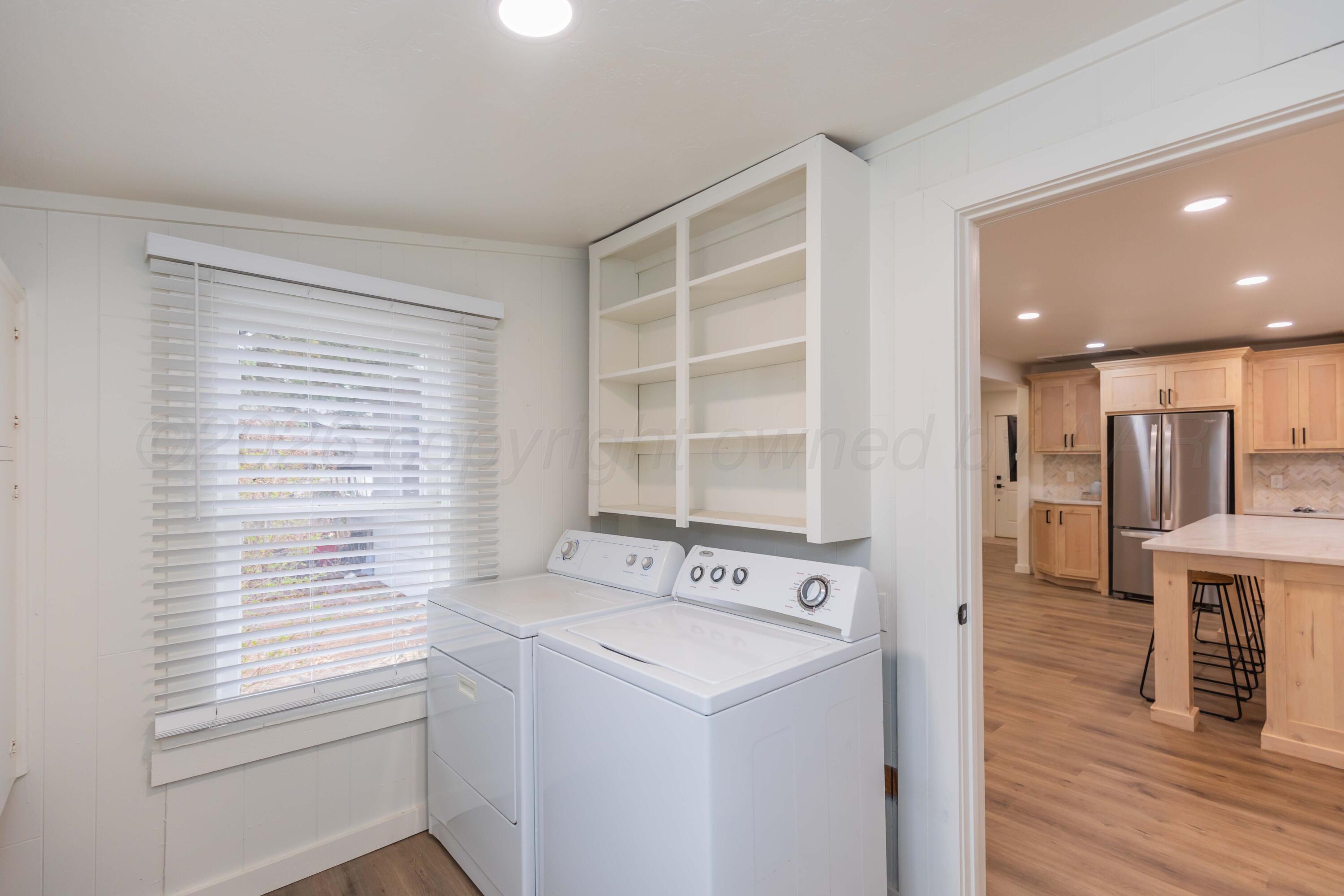 504 High Street Claude, TX 79019 - Photo 34 of 39 a view of a kitchen from the hallway