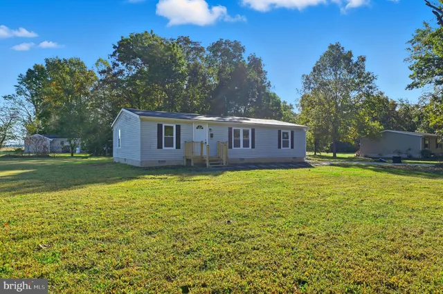 a view of a house with a swimming pool