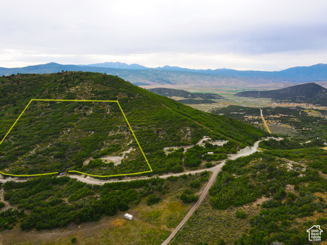 462 South Valleyview, Unit 462 Fairview, UT 84629 - Photo 20 of 38 Aerial view of property and surrounding area featuring mountains and property parcel outlined