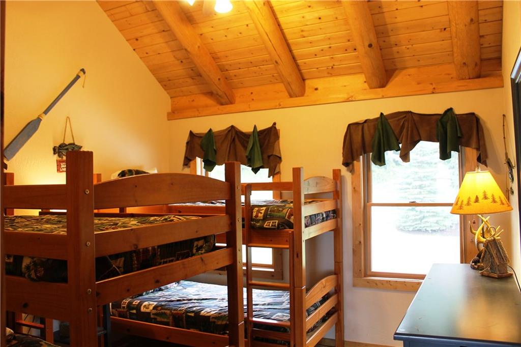 793 Fire Tower Road Champion, PA 15622 - Photo 18 of 25 This bedroom has two sets of single bunk beds and a loft. It is located on the second level and the bath is in the hallway.
