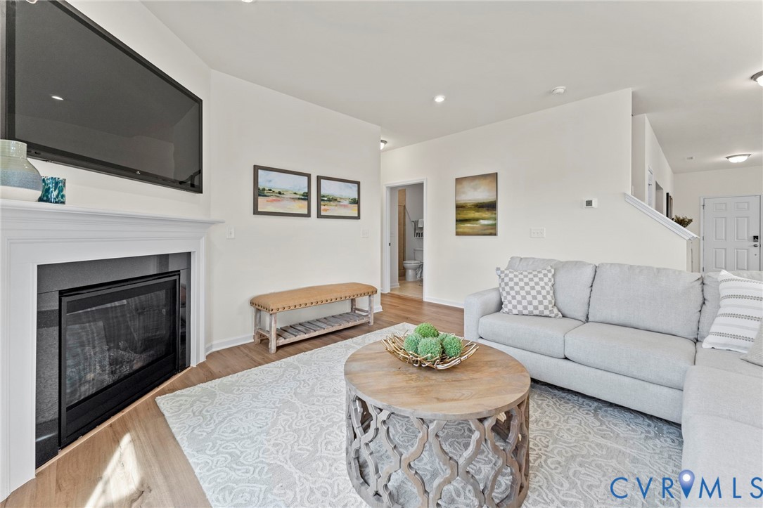 5300 Qualla Trace Chesterfield, VA 23832 - Photo 13 of 38 a living room with furniture and a fireplace