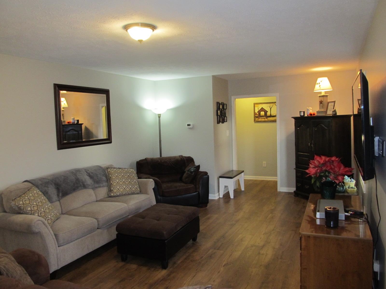 2118 Knightly Mill Road Fort Defiance, VA 24437 - Photo 11 of 49 a living room with furniture and a flat screen tv