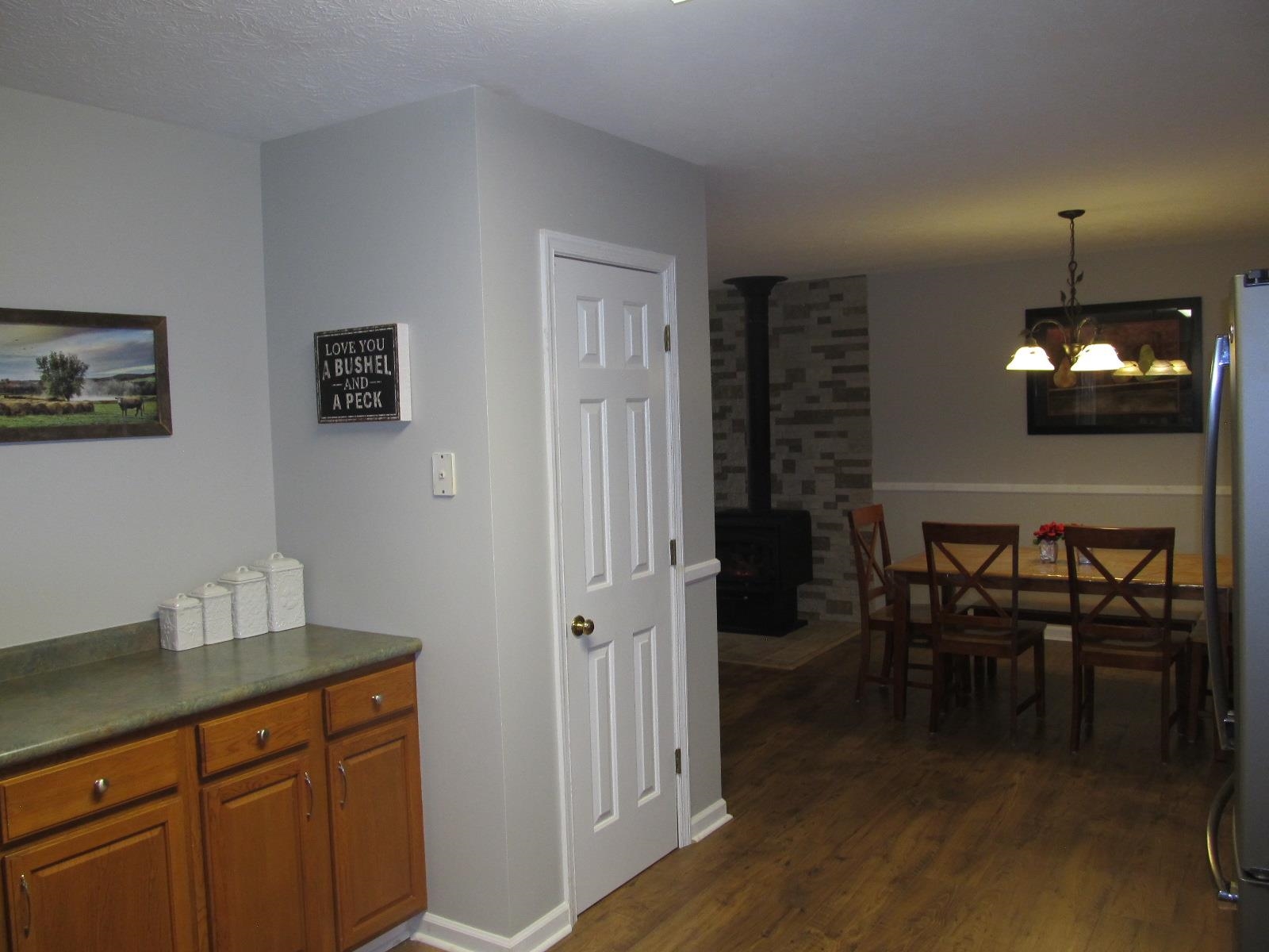 2118 Knightly Mill Road Fort Defiance, VA 24437 - Photo 16 of 49 a kitchen with a table chairs and entryway