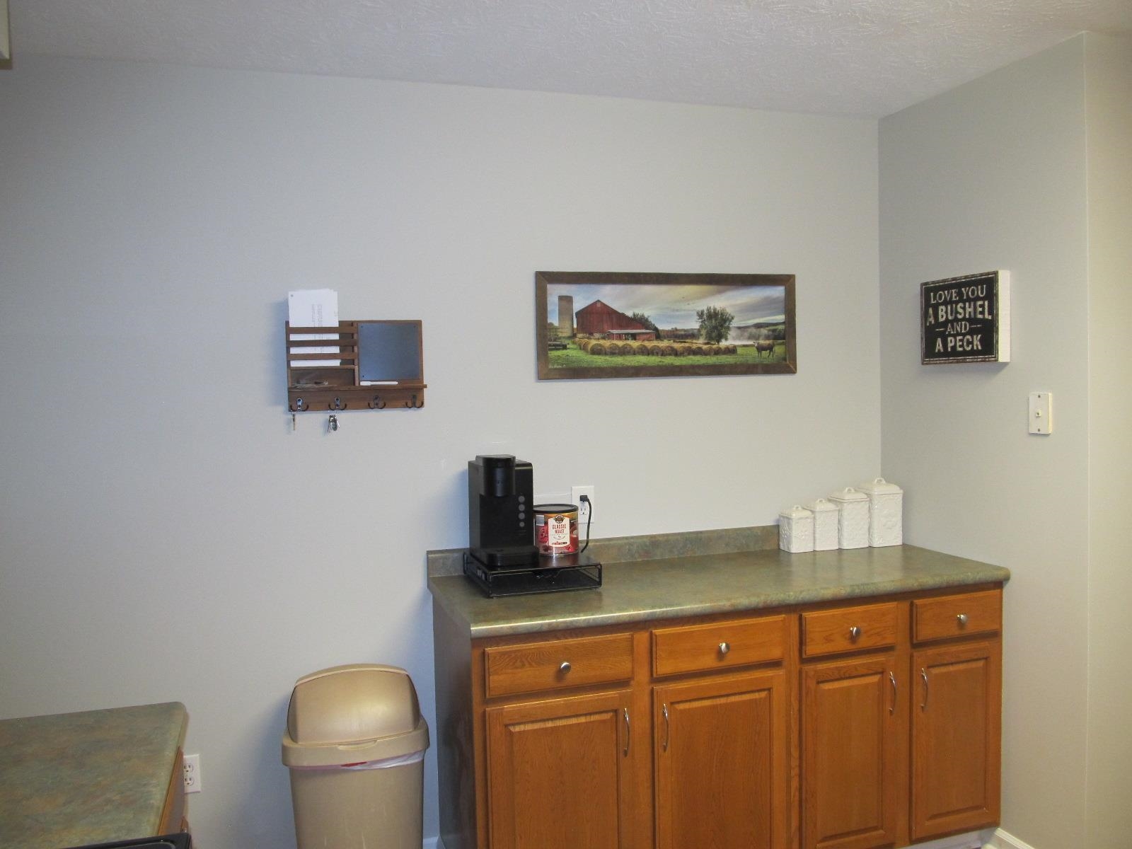2118 Knightly Mill Road Fort Defiance, VA 24437 - Photo 19 of 49 a view of a workspace with furniture and wooden floor