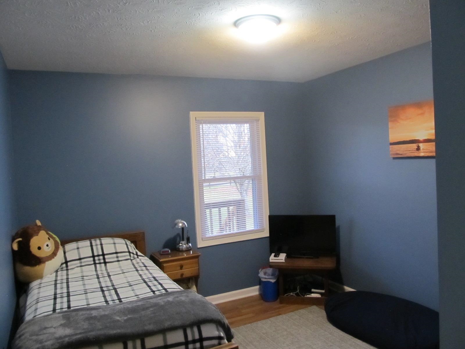 2118 Knightly Mill Road Fort Defiance, VA 24437 - Photo 26 of 49 a bedroom with a bed and a window