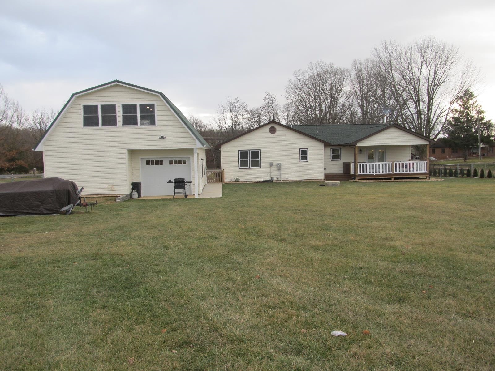 2118 Knightly Mill Road Fort Defiance, VA 24437 - Photo 5 of 49 a front view of a house with a yard
