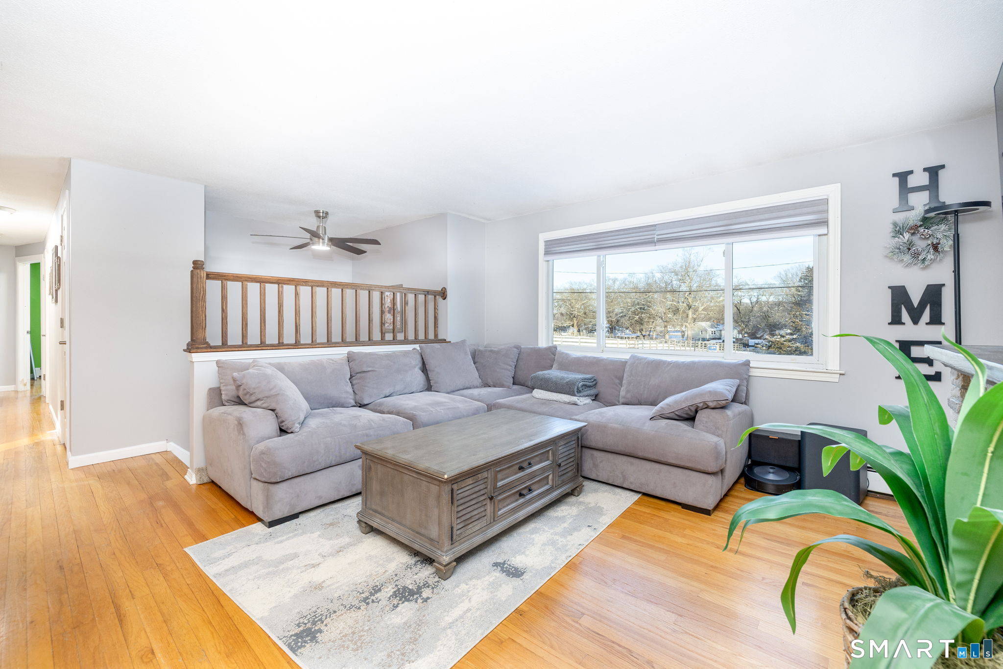 134 Massapeag Side Road Montville, CT 06382 - Photo 11 of 33 a living room with furniture and a large window