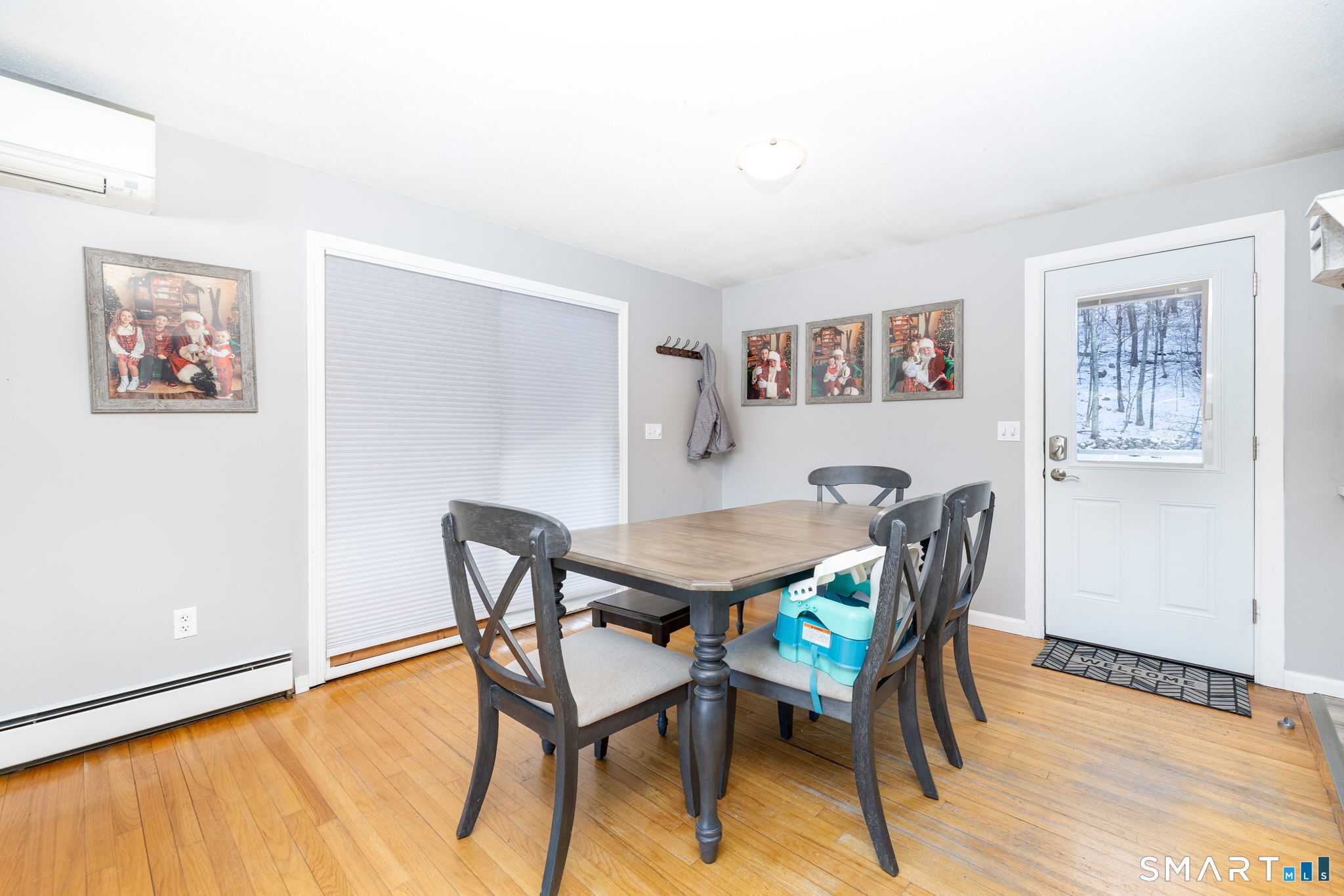 134 Massapeag Side Road Montville, CT 06382 - Photo 13 of 33 a view of a dining room with furniture and wooden floor