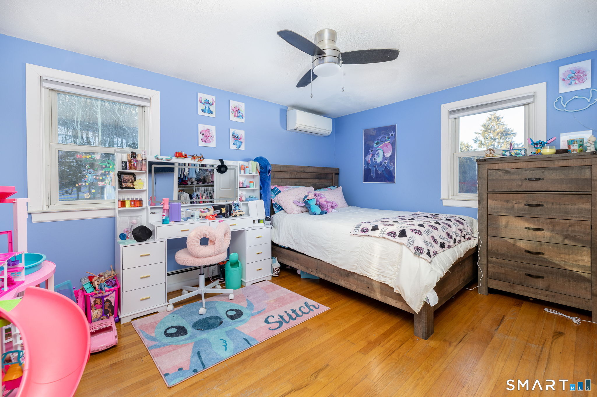 134 Massapeag Side Road Montville, CT 06382 - Photo 19 of 33 a bedroom with a bed a dresser and next to a window