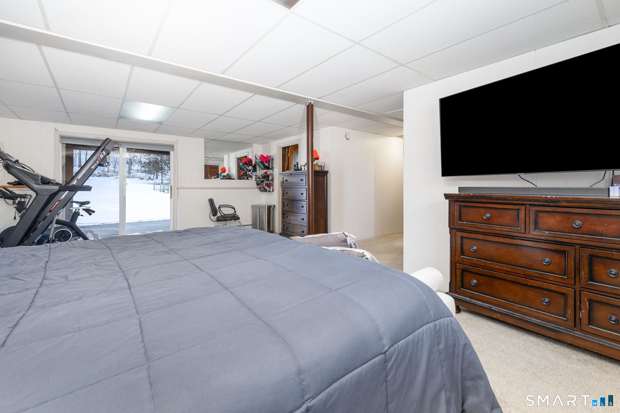 134 Massapeag Side Road Montville, CT 06382 - Photo 21 of 33 a bedroom with a bed and a flat screen tv