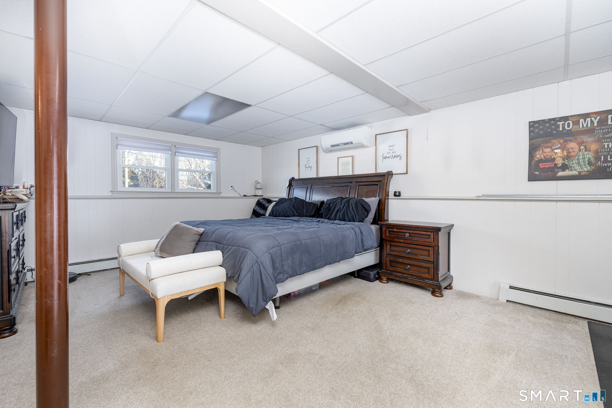 134 Massapeag Side Road Montville, CT 06382 - Photo 22 of 33 a bedroom with furniture and windows