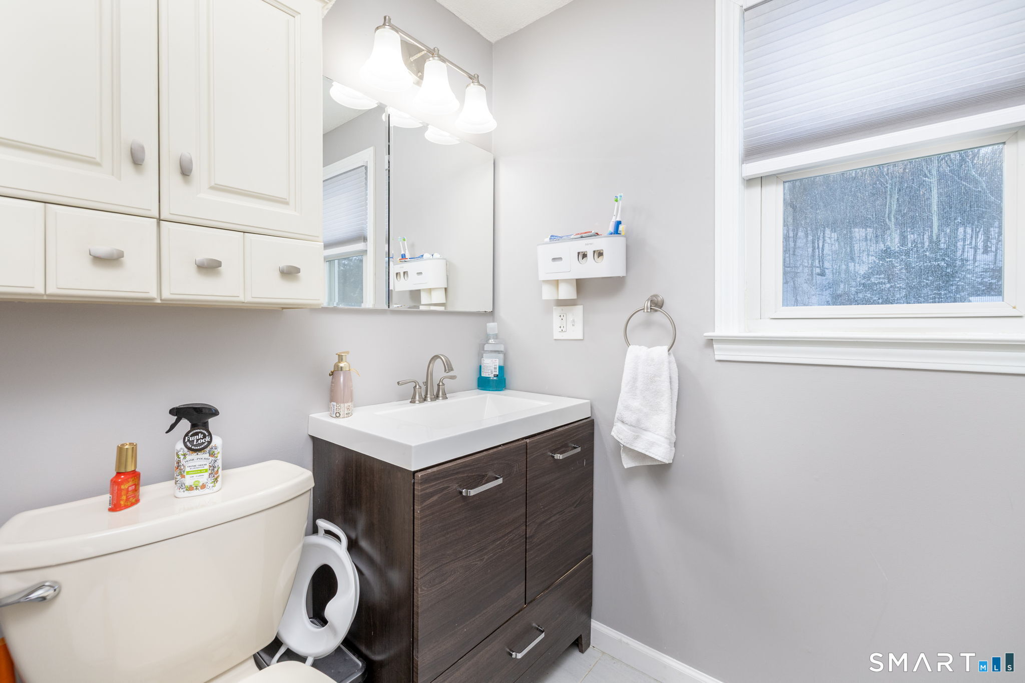134 Massapeag Side Road Montville, CT 06382 - Photo 23 of 33 a utility room with cabinets washer and dryer