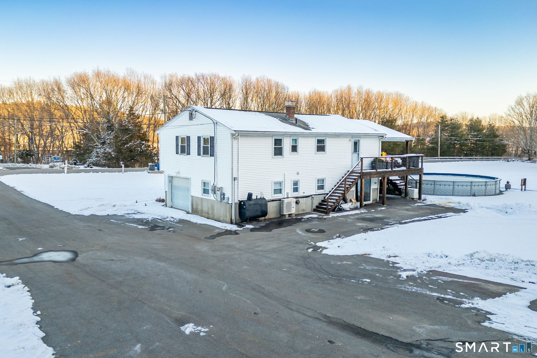 134 Massapeag Side Road Montville, CT 06382 - Photo 25 of 33 a view of a house with a patio