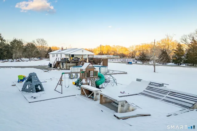 an aerial view of a chairs with table and chairs
