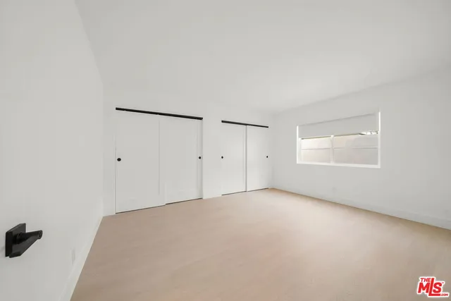 an empty room with a natural light