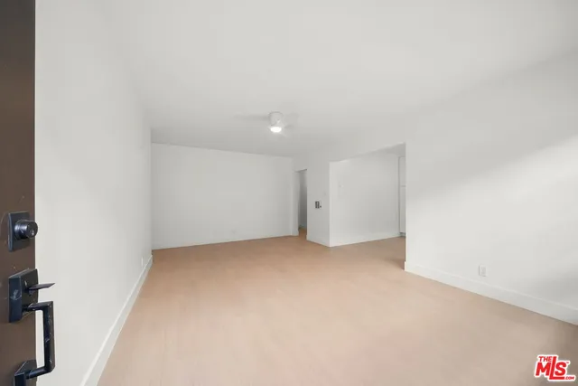 an empty room with an entryway