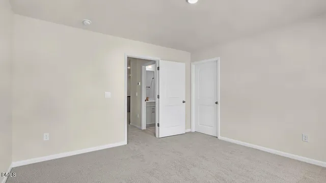 a front view of a house with swimming pool having outdoor seating
