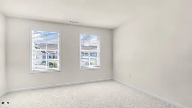 a view of swimming pool and a buildings in the background