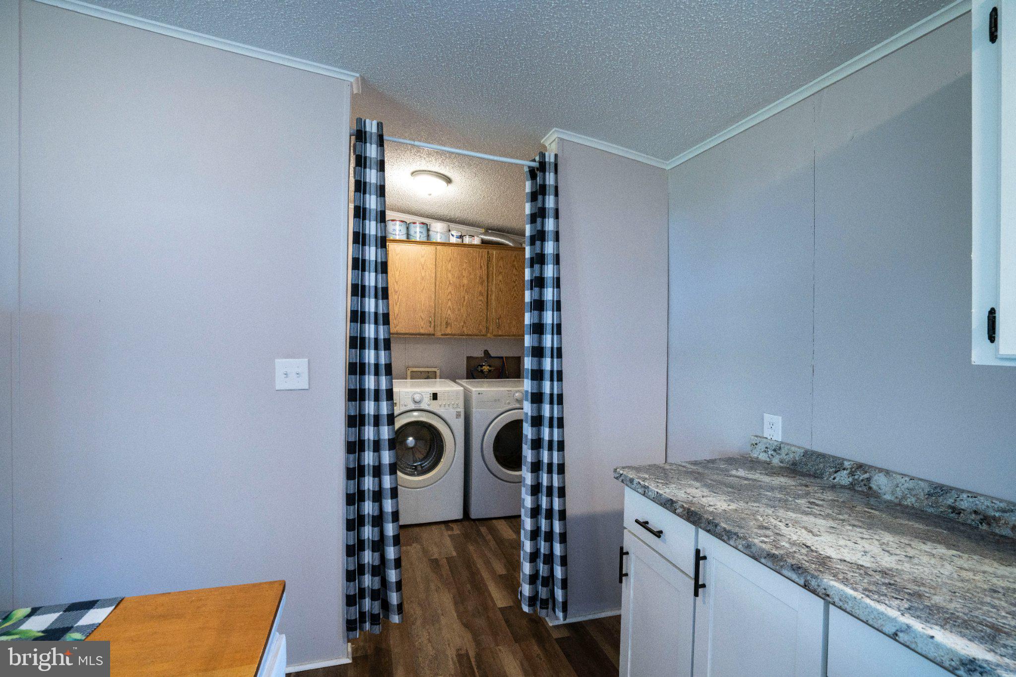 282 Circle Road Bellefonte, PA 16823 - Photo 9 of 32 Charming laundry nook with stylish curtains.