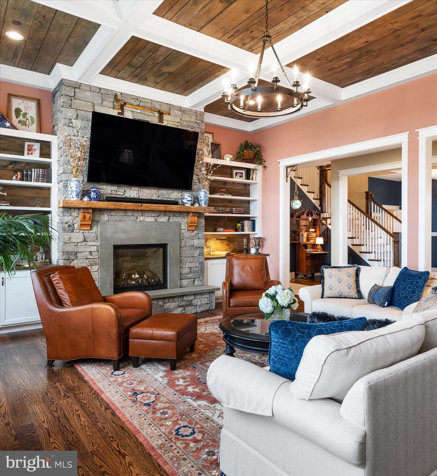 828 Federal Hill Road Street, MD 21154 - Photo 16 of 73 a living room with furniture a flat screen tv and a fireplace