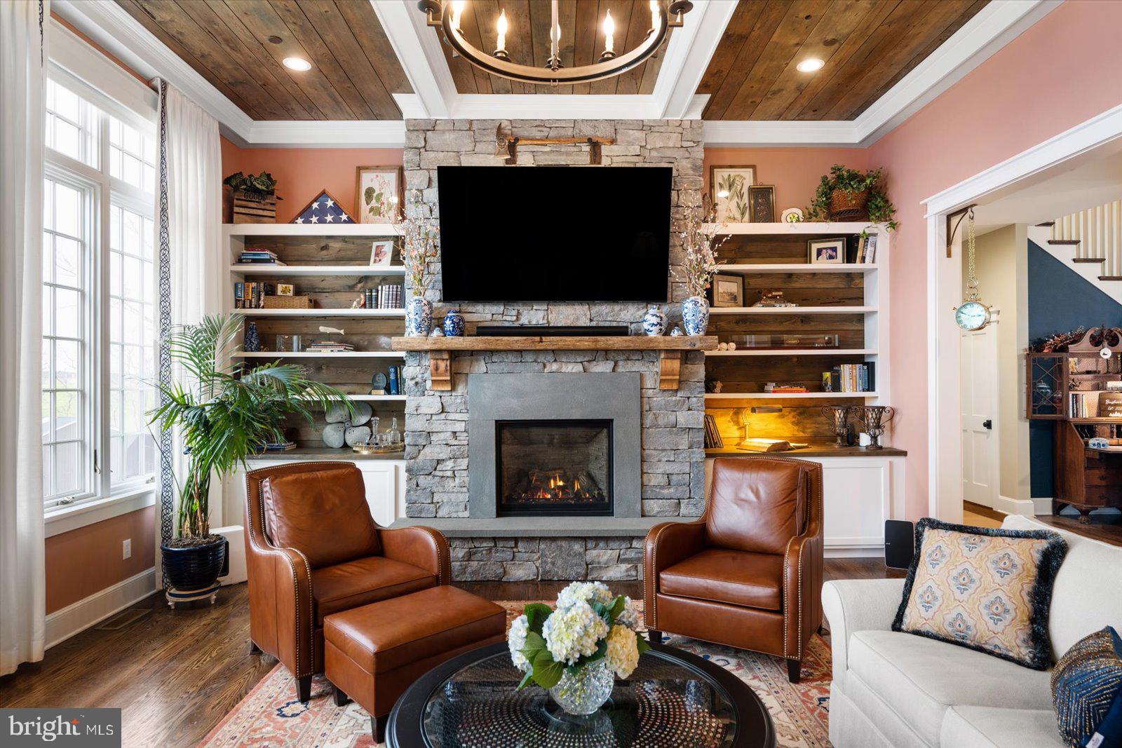 828 Federal Hill Road Street, MD 21154 - Photo 17 of 73 a living room with furniture a flat screen tv and a fireplace